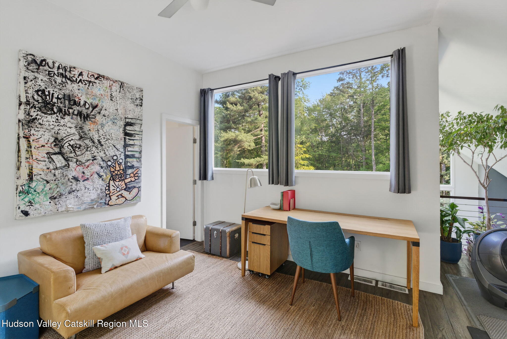 69 Irondale Road Phoenicia, NY 12464 - Photo 14 of 30 a living room with furniture and a window