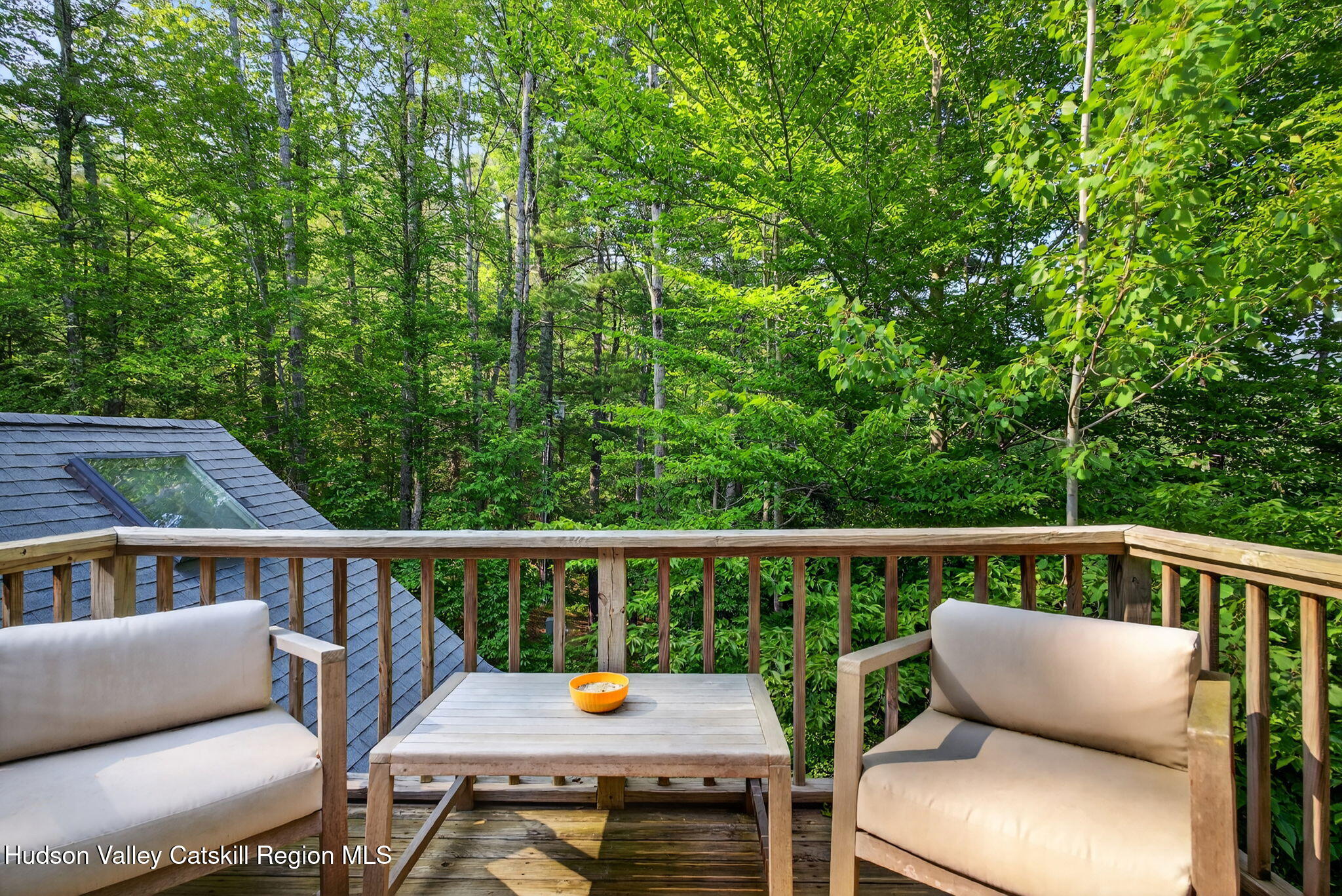 69 Irondale Road Phoenicia, NY 12464 - Photo 16 of 30 a view of roof with two chairs and a table