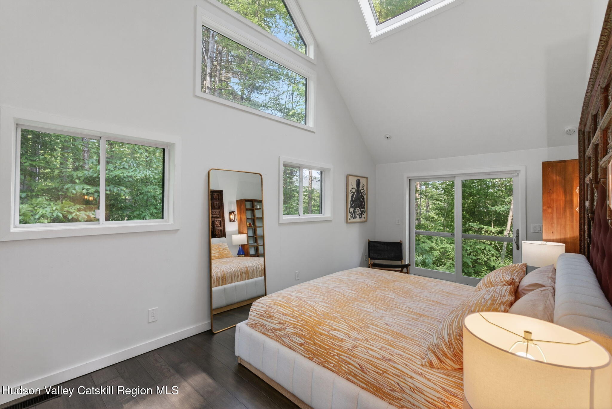 69 Irondale Road Phoenicia, NY 12464 - Photo 18 of 30 a bedroom with a bed and a large window