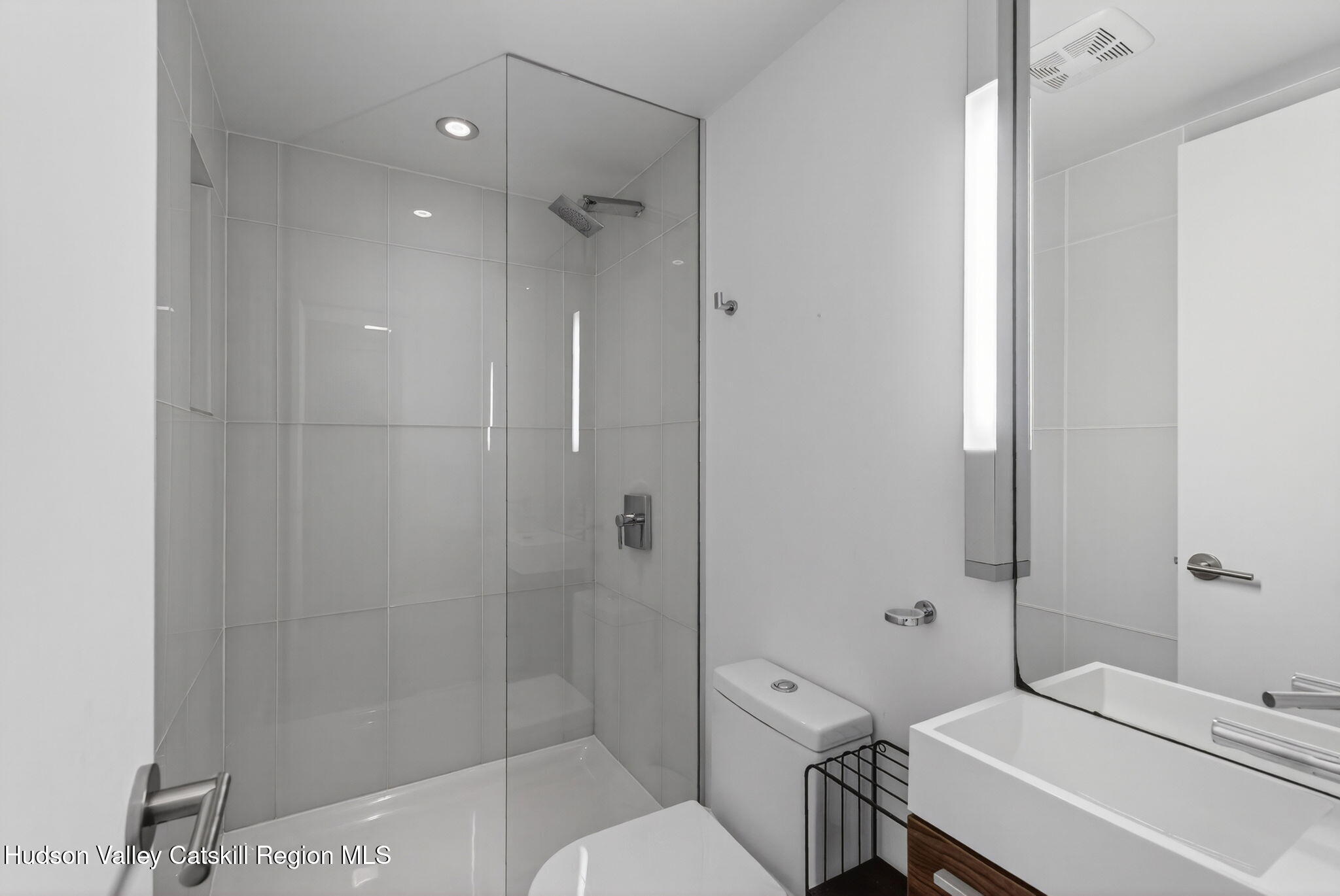 69 Irondale Road Phoenicia, NY 12464 - Photo 24 of 30 a bathroom with a sink toilet and shower