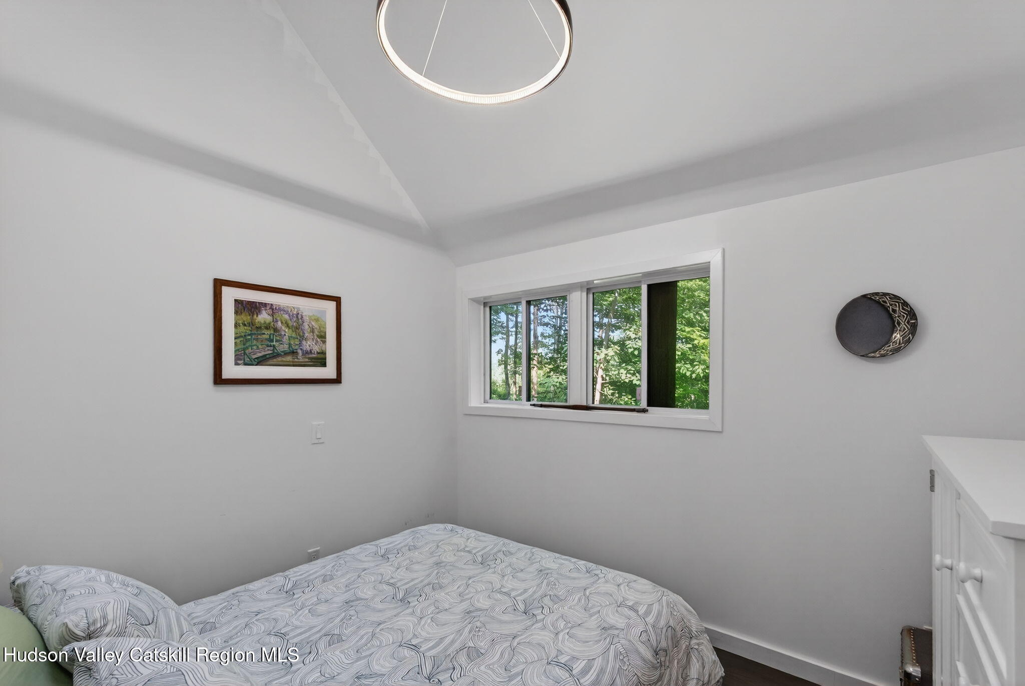69 Irondale Road Phoenicia, NY 12464 - Photo 25 of 30 a bedroom with a bed and a window