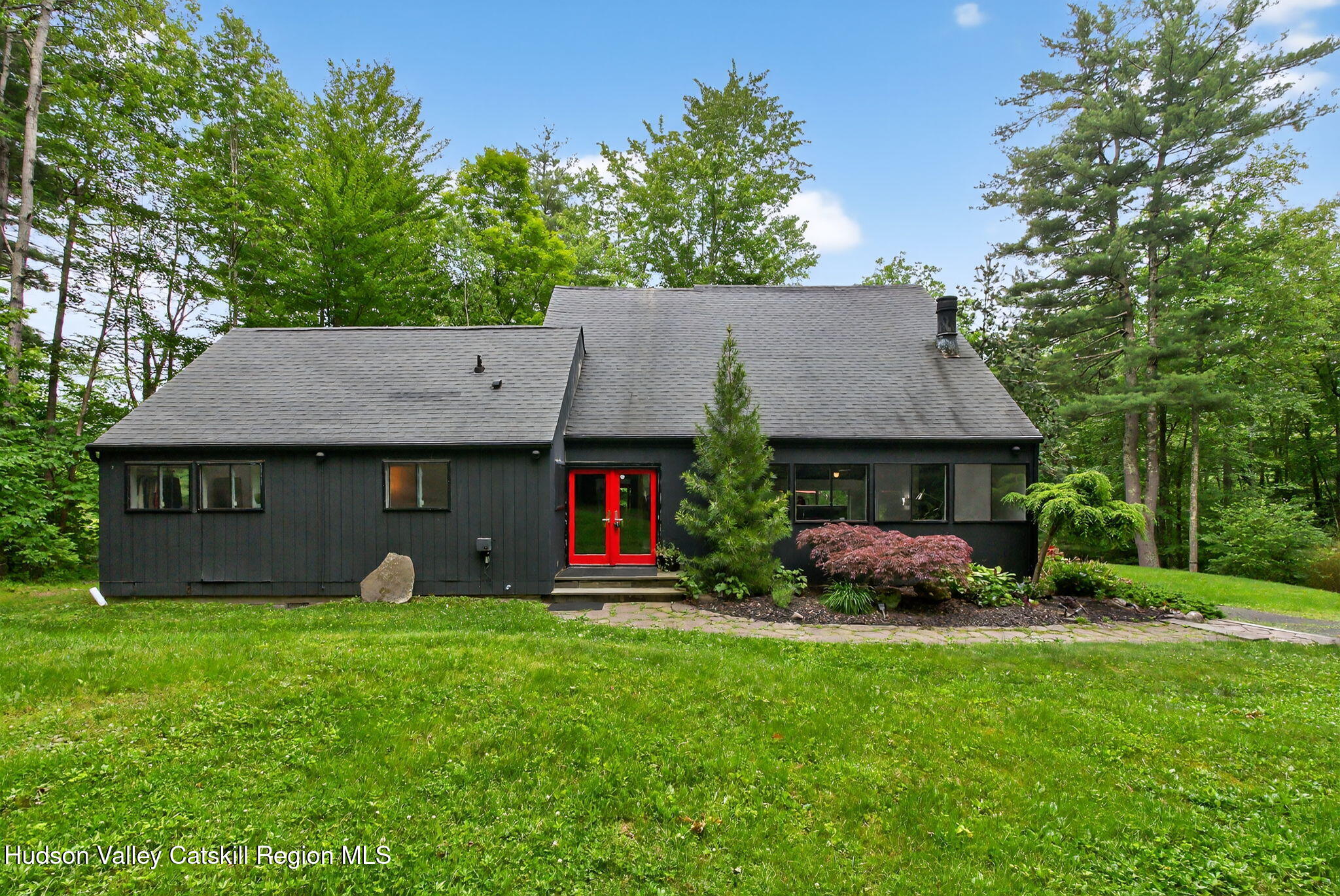 69 Irondale Road Phoenicia, NY 12464 - Photo 3 of 30 a front view of a house with garden