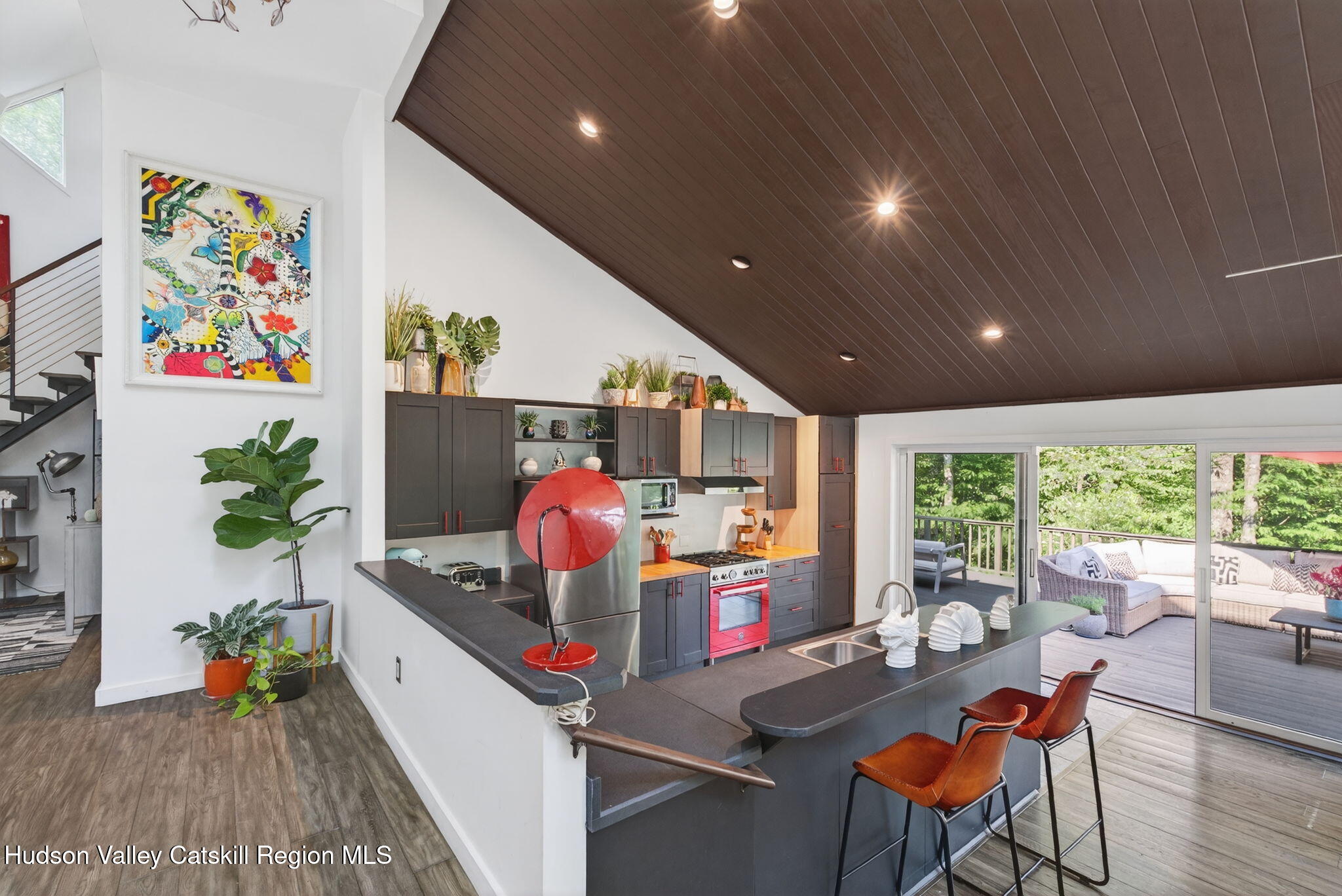 69 Irondale Road Phoenicia, NY 12464 - Photo 7 of 30 a room with furniture and a potted plant