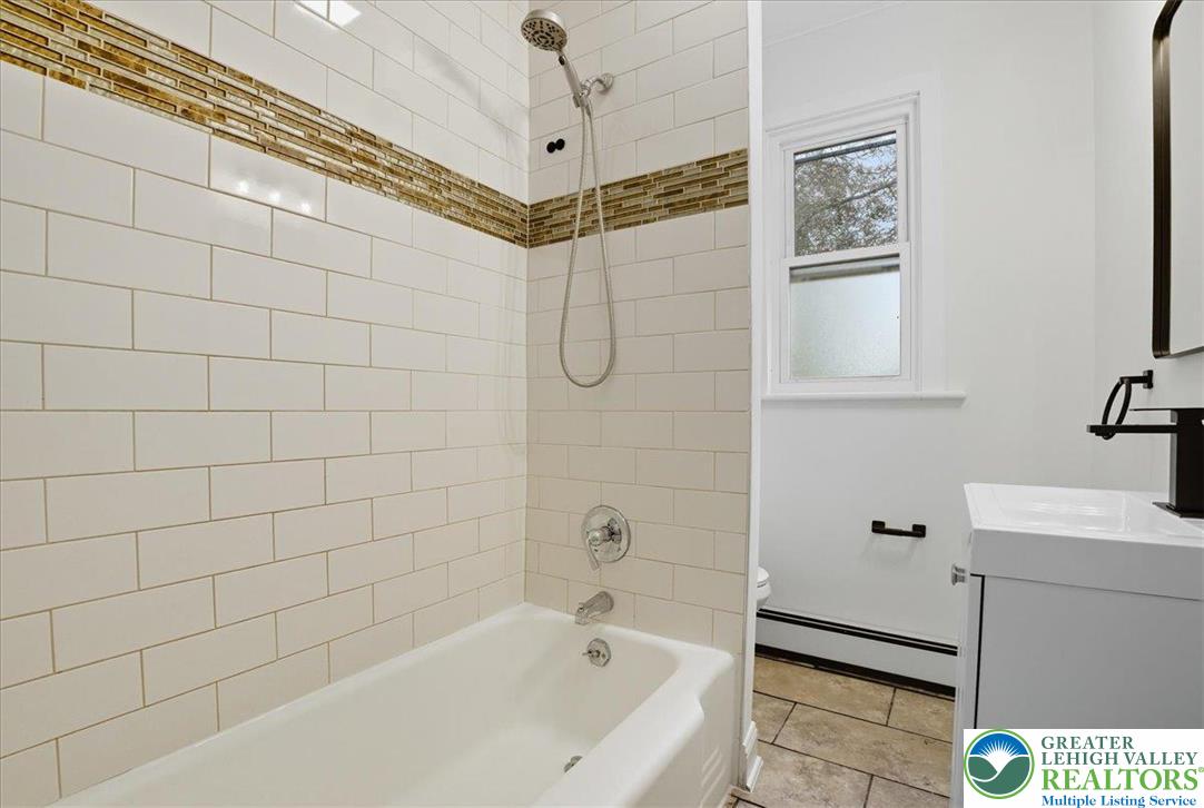 170 South Church Street Nazareth, PA 18064 - Photo 13 of 23 a bathroom with a bathtub and shower