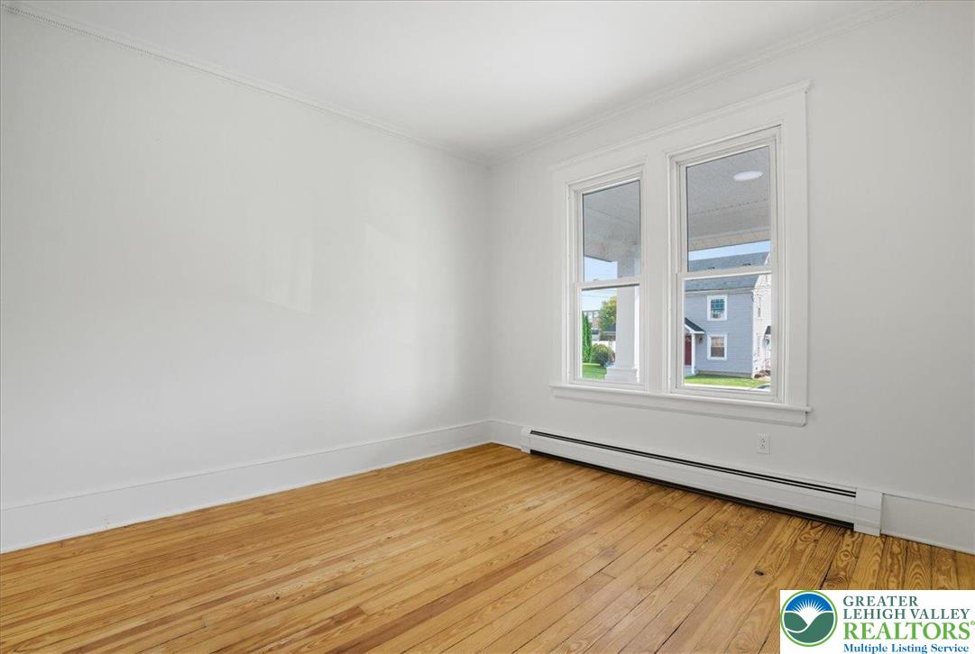 170 South Church Street Nazareth, PA 18064 - Photo 7 of 23 a view of an empty room with wooden floor and a window