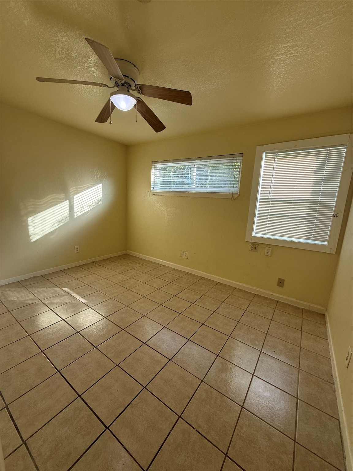 3502 Campbell Street, Unit 2 Houston, TX 77026 - Photo 9 of 14 a view of an empty room and a window