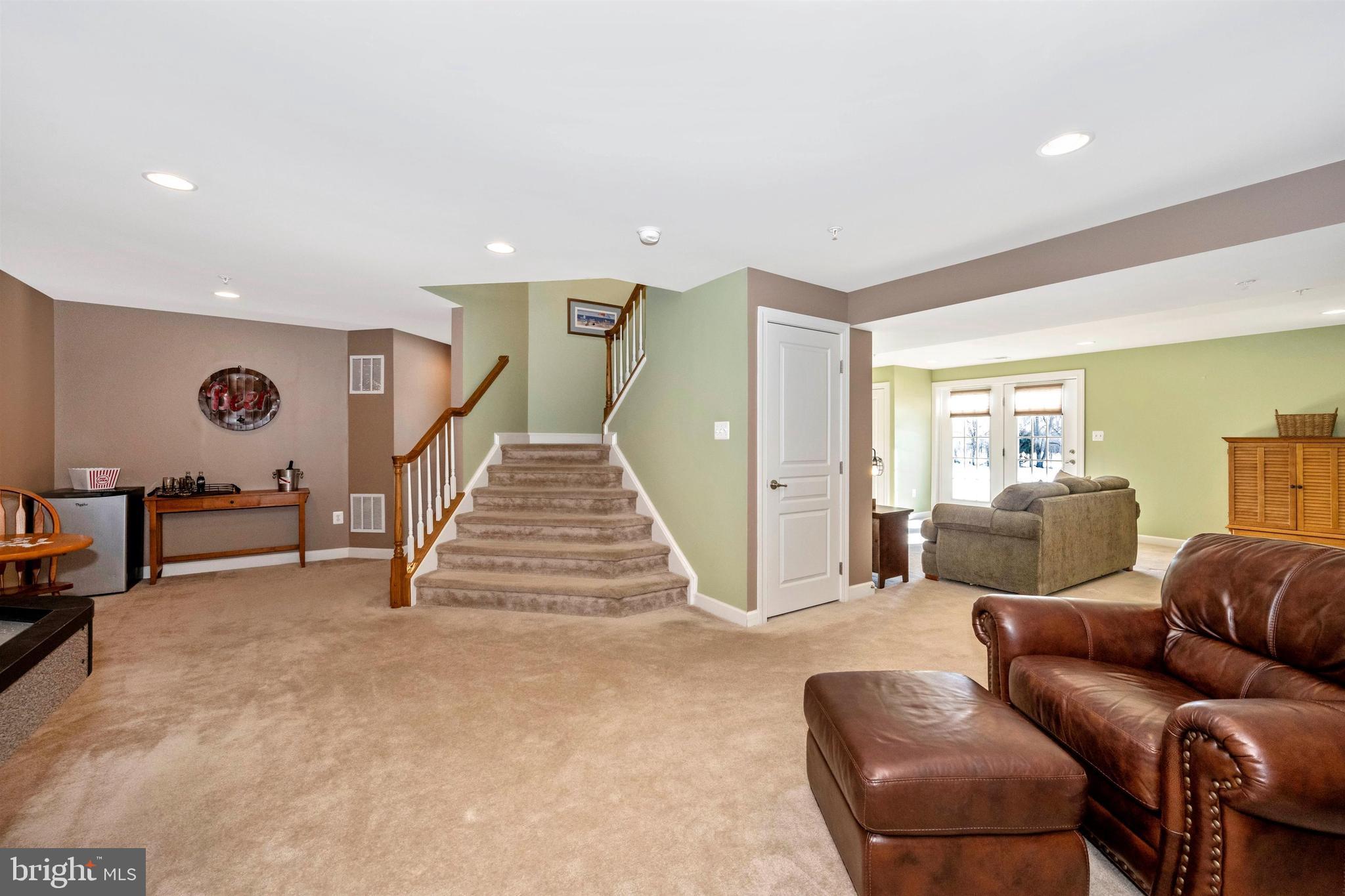 23410 Kimblehunt Place Gaithersburg, MD 20882 - Photo 38 of 72 Waterfall staircase to lower level.