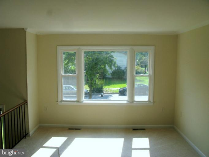 5618 Westgate Road Lanham, MD 20706 - Photo 14 of 17 an empty room with a window