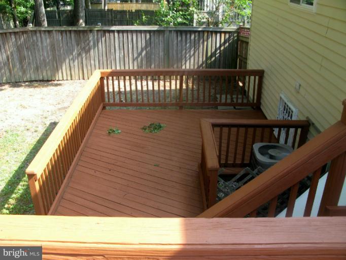 5618 Westgate Road Lanham, MD 20706 - Photo 16 of 17 a view of deck and wooden fence