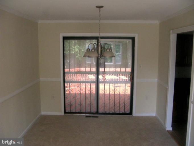5618 Westgate Road Lanham, MD 20706 - Photo 9 of 17 a view of an empty room with a window