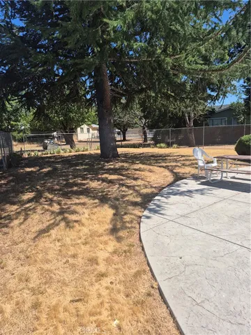 a view of yard covered with snow