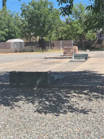 a view of a street with a building in the background