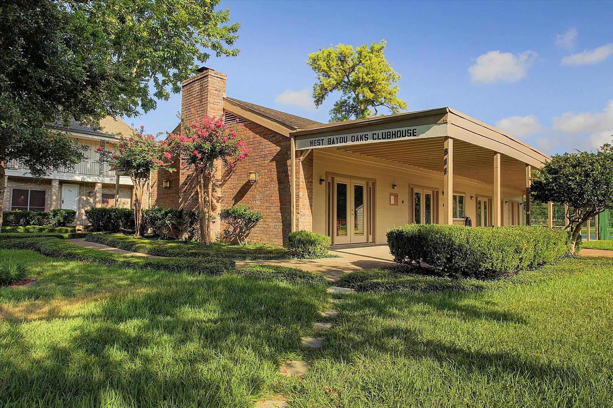 811 Threadneedle Street, Unit 258 Houston, TX 77079 - Photo 39 of 39 a front view of a house with a yard