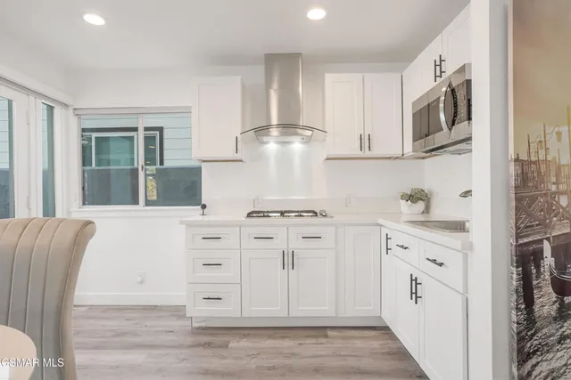 a living room with furniture and window