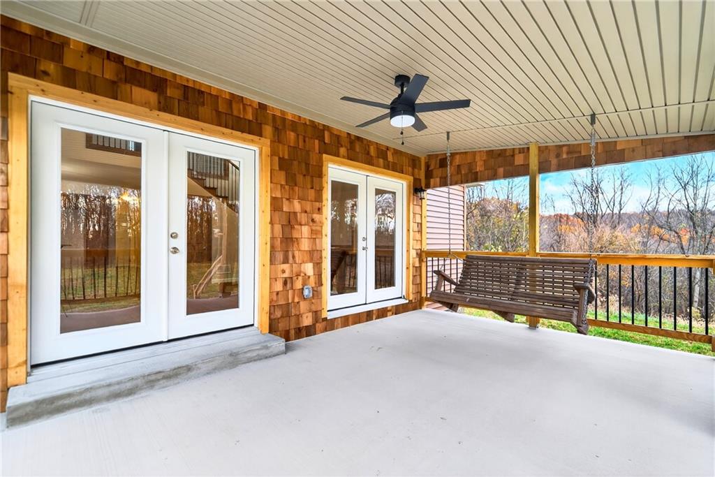 524 Sawmill Road Dawson, PA 15428 - Photo 13 of 50 a view of an empty room with a balcony