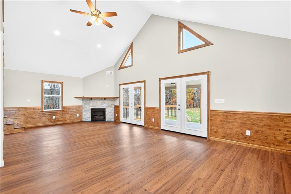 524 Sawmill Road Dawson, PA 15428 - Photo 16 of 50 a view of an empty room with wooden floor fireplace and a window