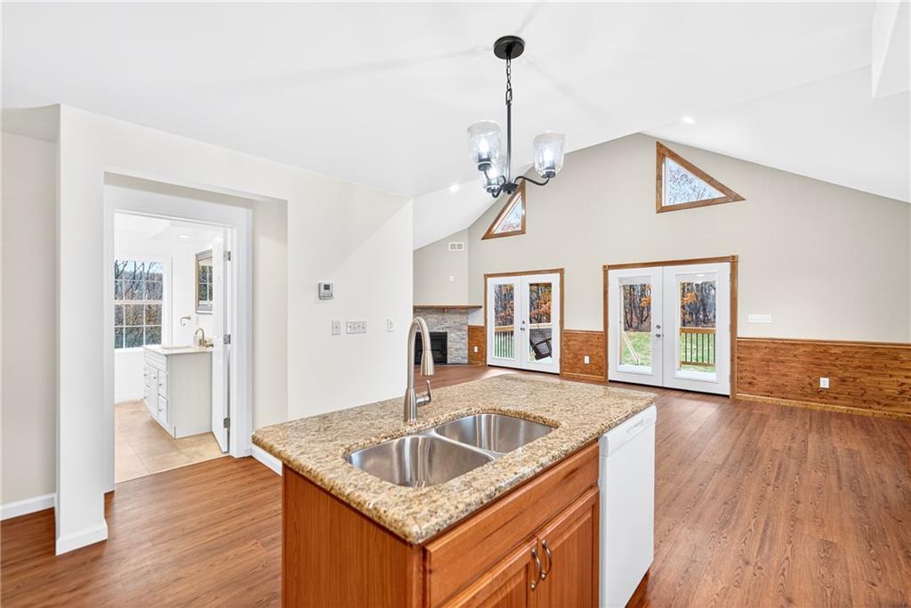 524 Sawmill Road Dawson, PA 15428 - Photo 26 of 50 a kitchen that has a sink a window and wooden floor