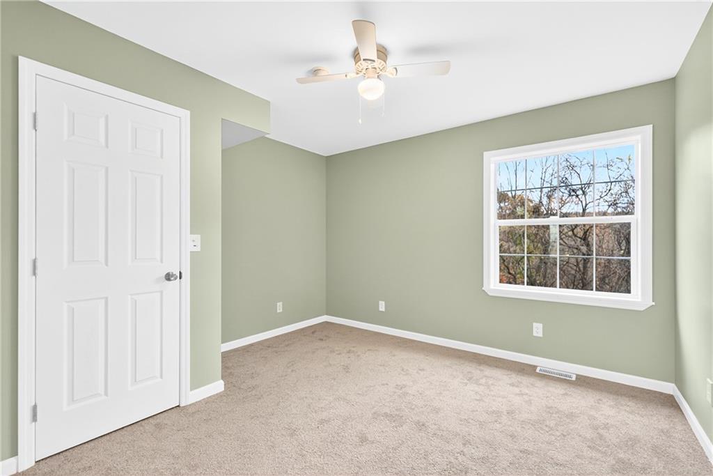 524 Sawmill Road Dawson, PA 15428 - Photo 32 of 50 a view of an empty room with a window