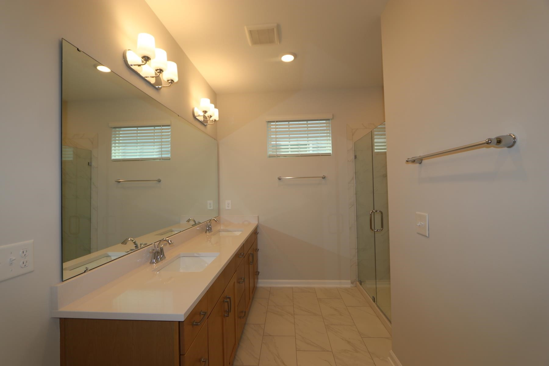 2106 Goudy Drive Raleigh, NC 27615 - Photo 11 of 24 a bathroom with a sink and a mirror