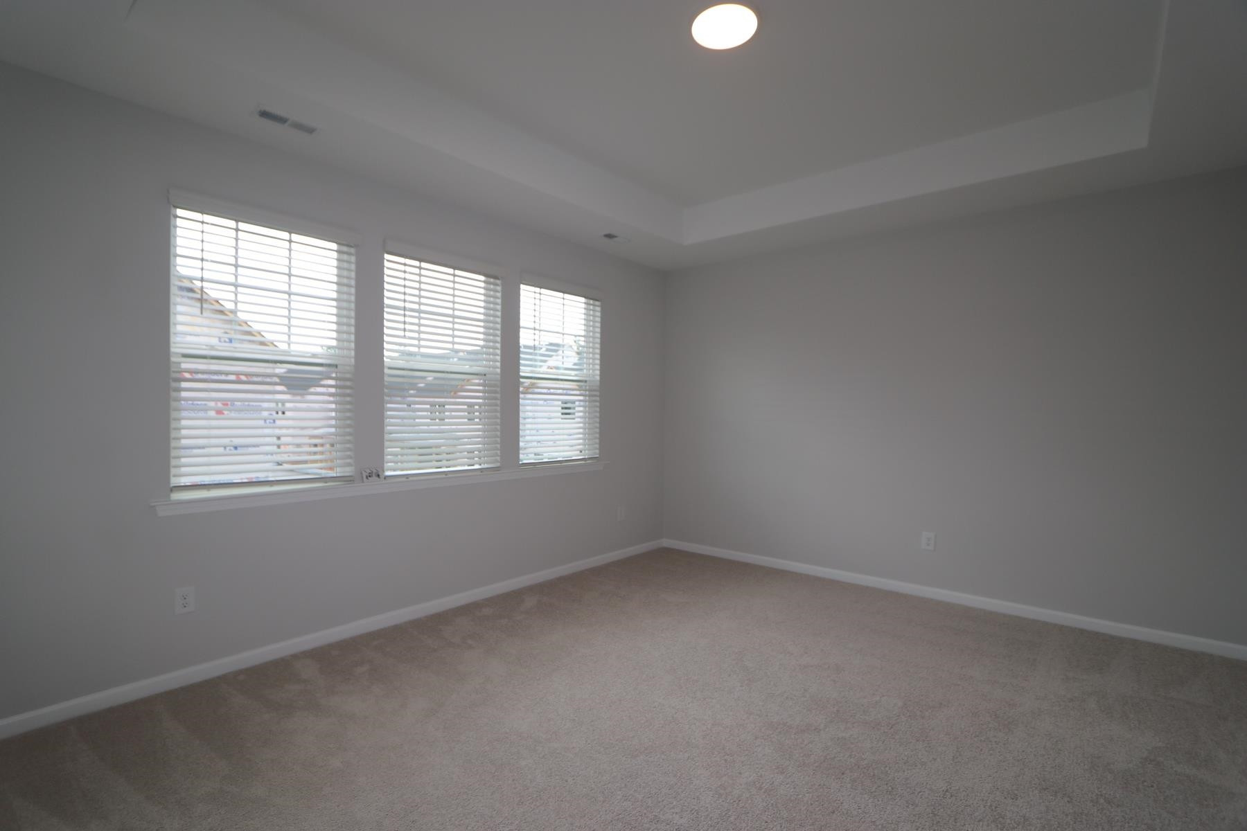 2106 Goudy Drive Raleigh, NC 27615 - Photo 13 of 24 an empty room with a window