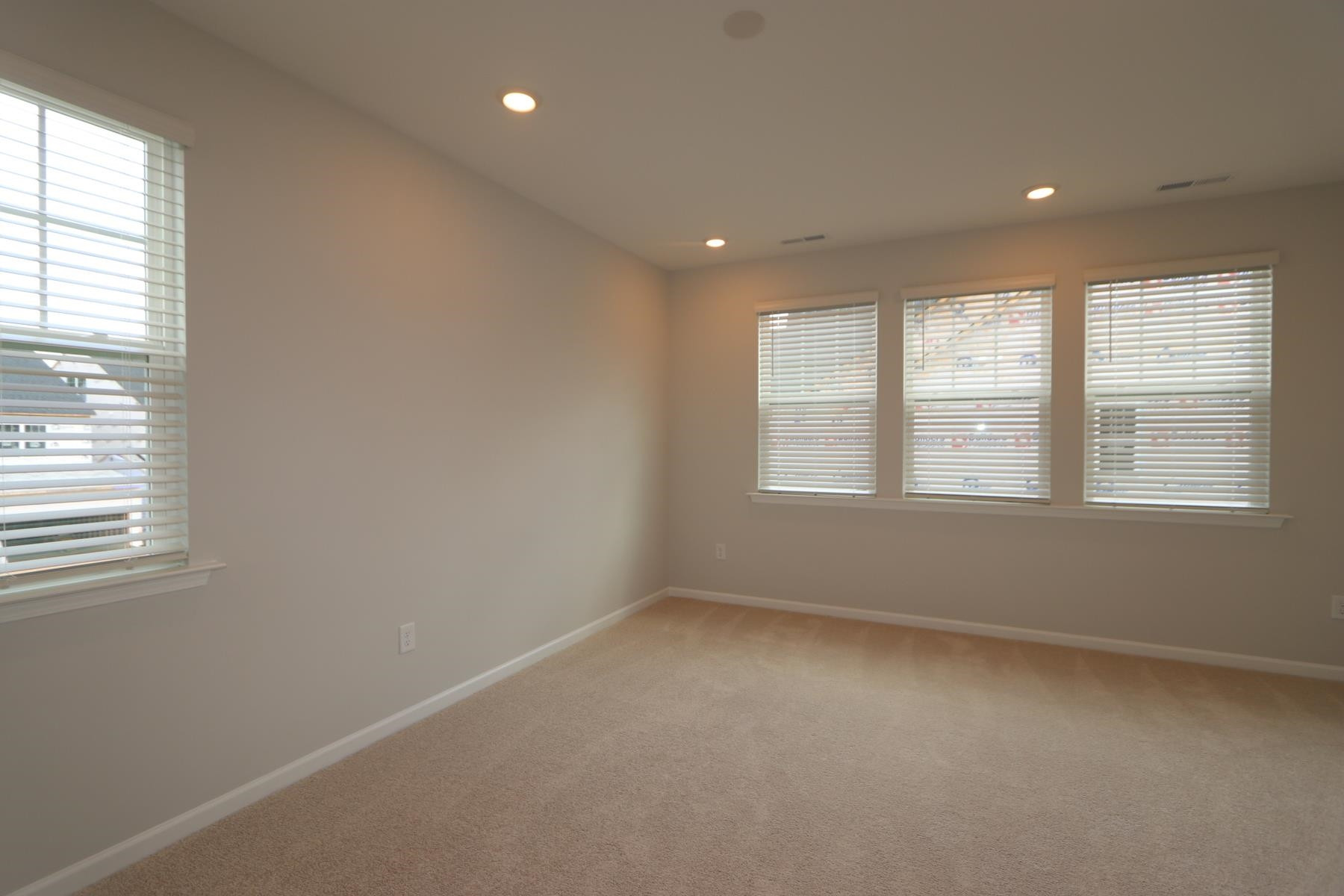 2106 Goudy Drive Raleigh, NC 27615 - Photo 15 of 24 an empty room with windows