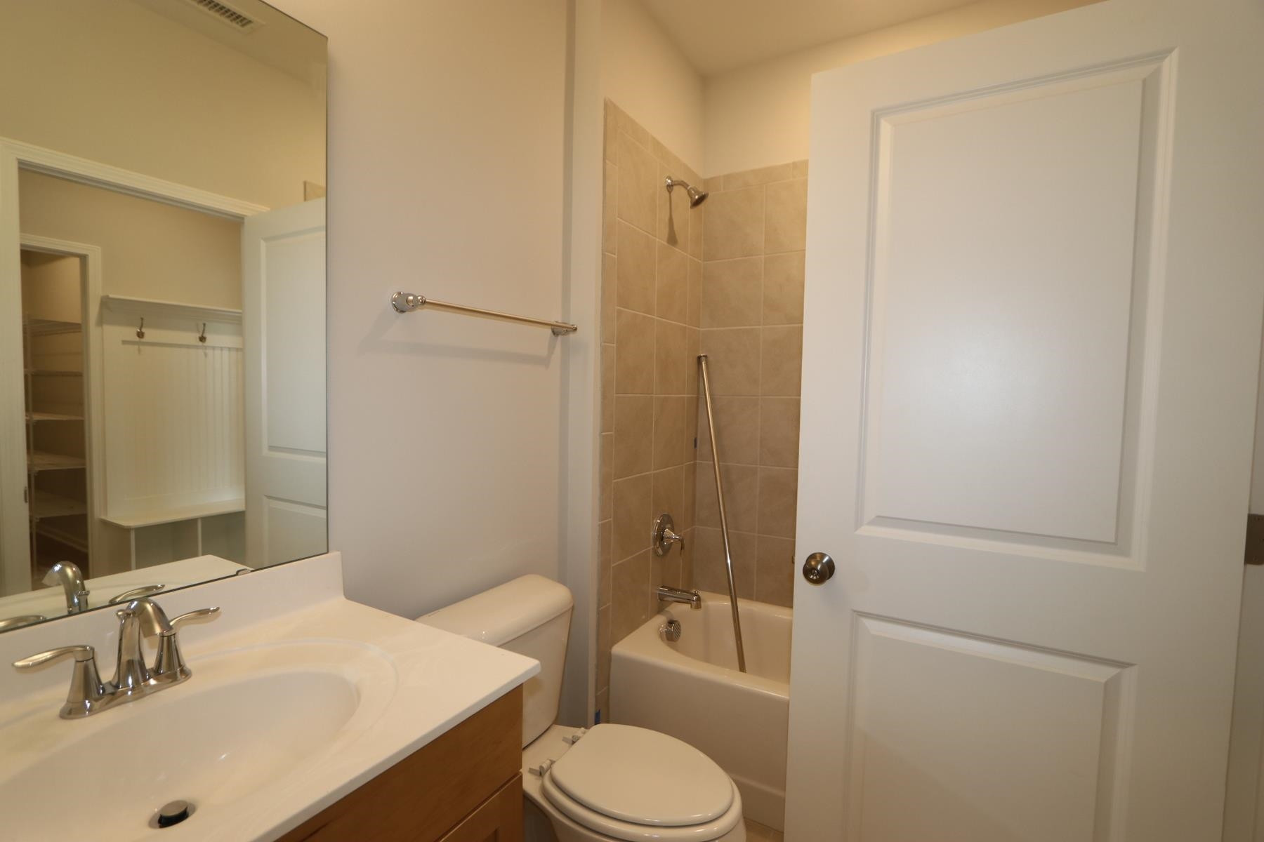 2106 Goudy Drive Raleigh, NC 27615 - Photo 21 of 24 a bathroom with a sink toilet and shower