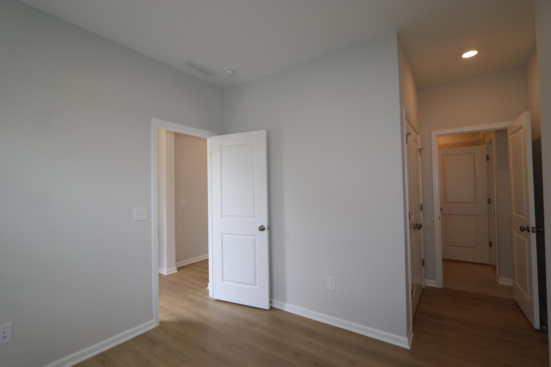 2106 Goudy Drive Raleigh, NC 27615 - Photo 22 of 24 wooden floor in an empty room