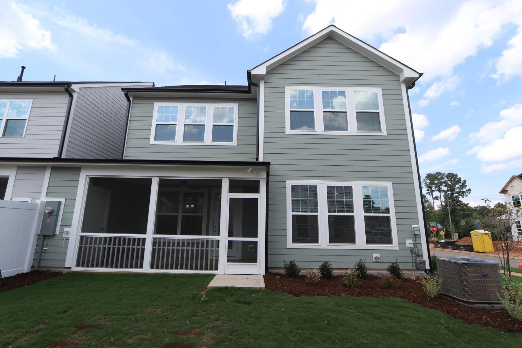 2106 Goudy Drive Raleigh, NC 27615 - Photo 3 of 24 a front view of a house with a yard