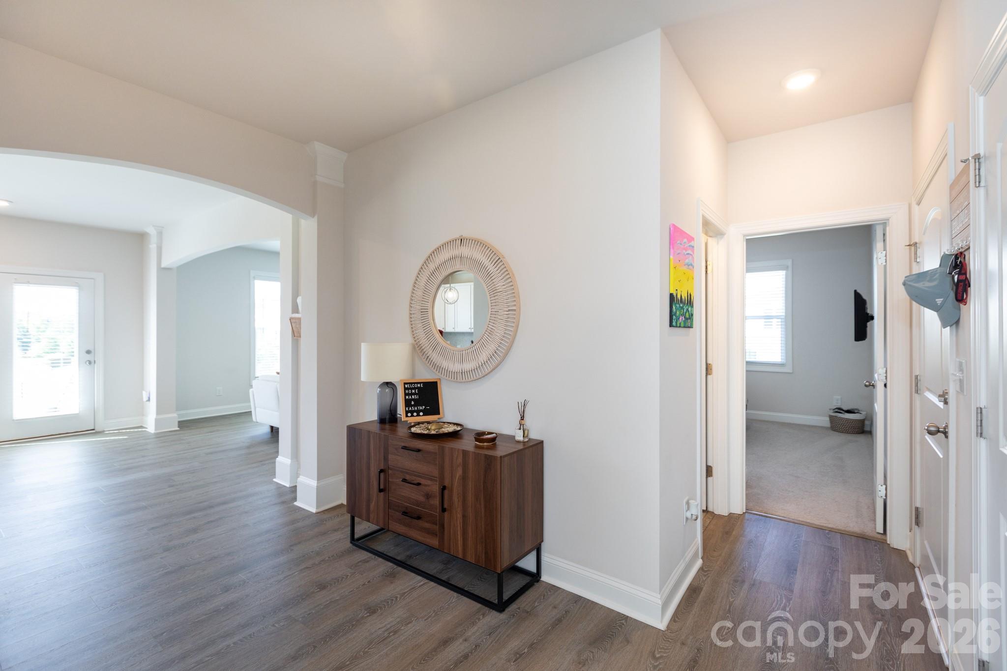 5415 Haystack Avenue Indian Land, SC 29707 - Photo 14 of 44 a view of a room with wooden floor mirror and windows
