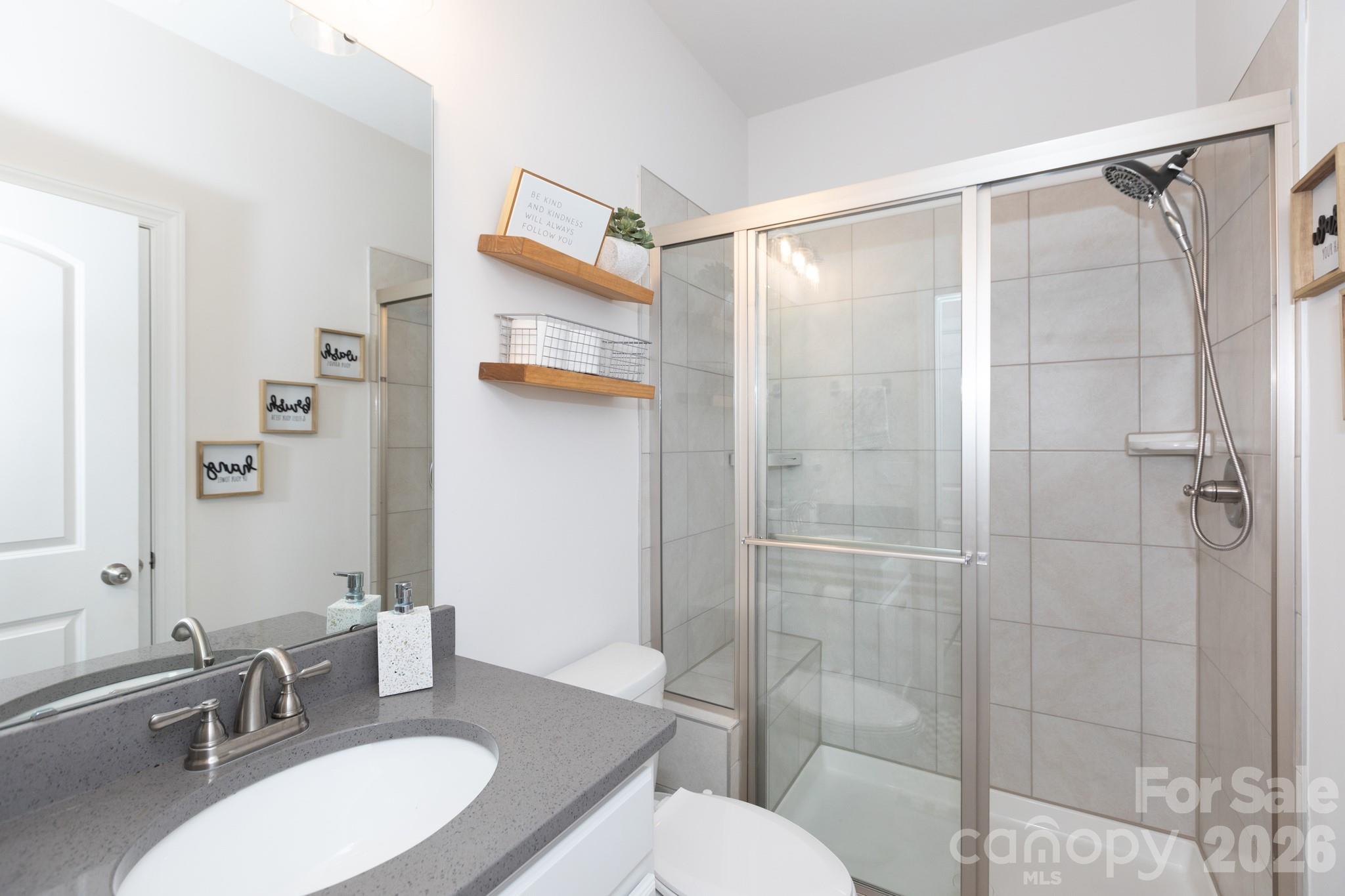 5415 Haystack Avenue Indian Land, SC 29707 - Photo 17 of 44 a bathroom with a sink toilet and shower