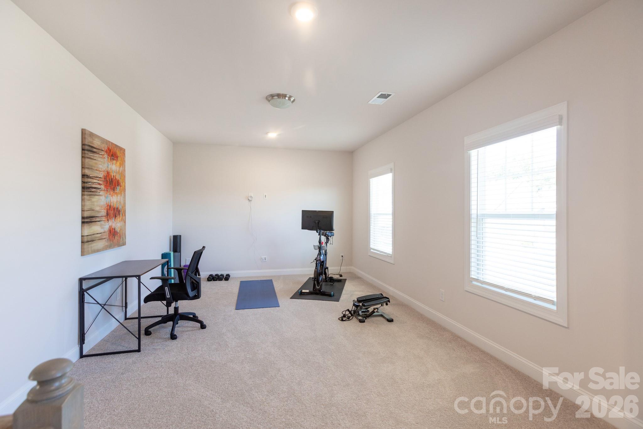 5415 Haystack Avenue Indian Land, SC 29707 - Photo 30 of 44 a view of a room with gym equipment and a window