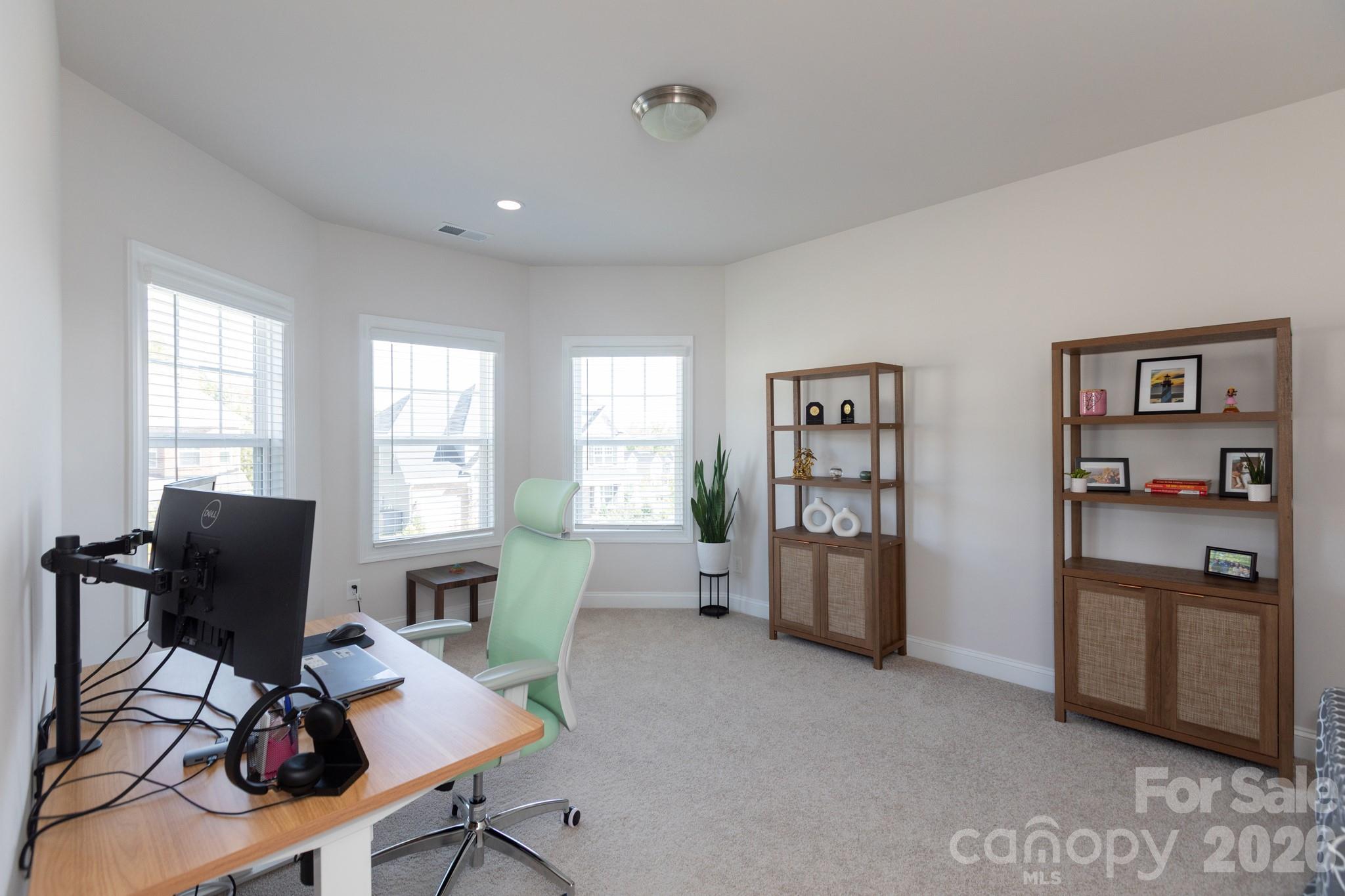 5415 Haystack Avenue Indian Land, SC 29707 - Photo 31 of 44 a view of a workspace with furniture and a window