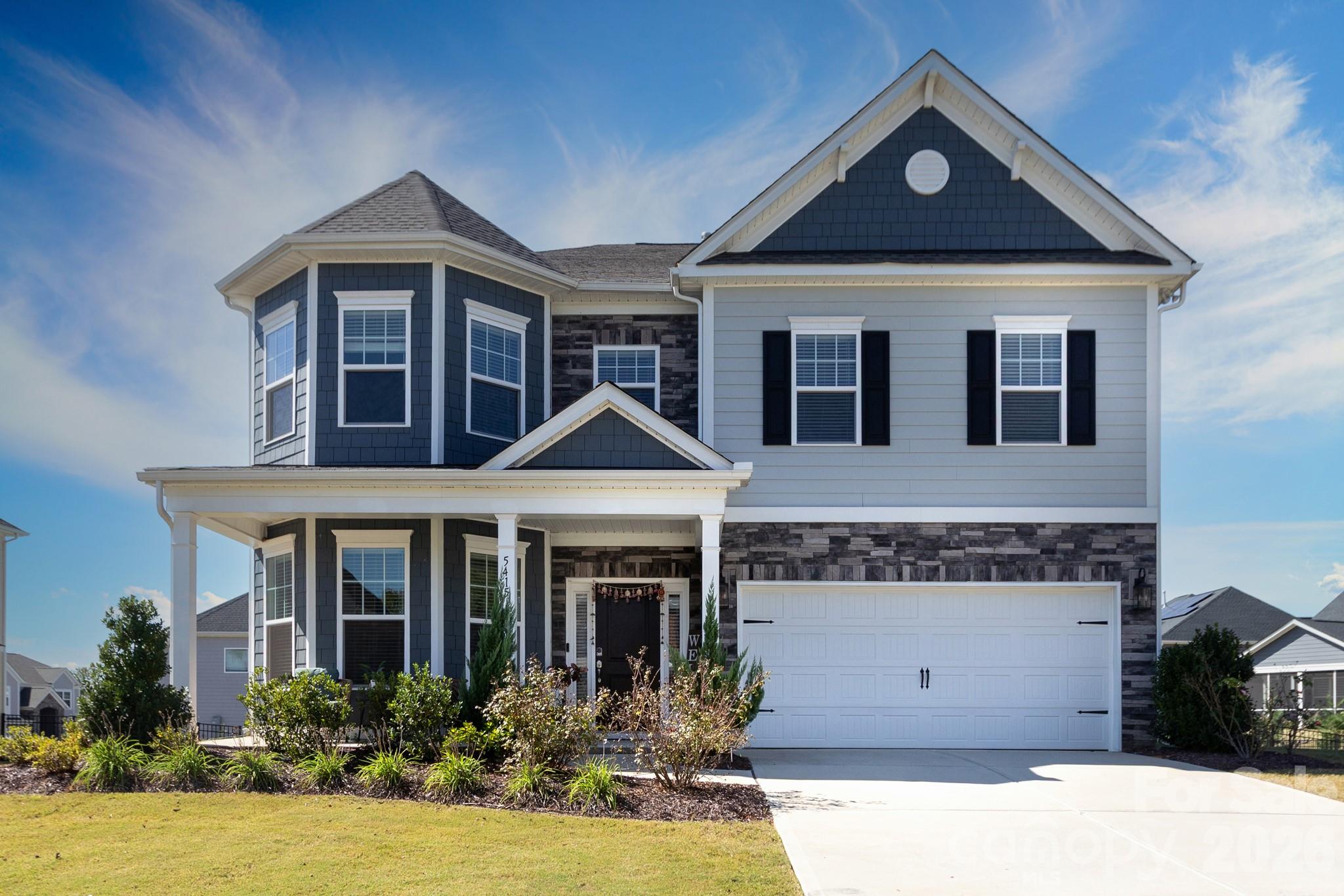 5415 Haystack Avenue Indian Land, SC 29707 - Photo 39 of 44 a front view of a house with a yard