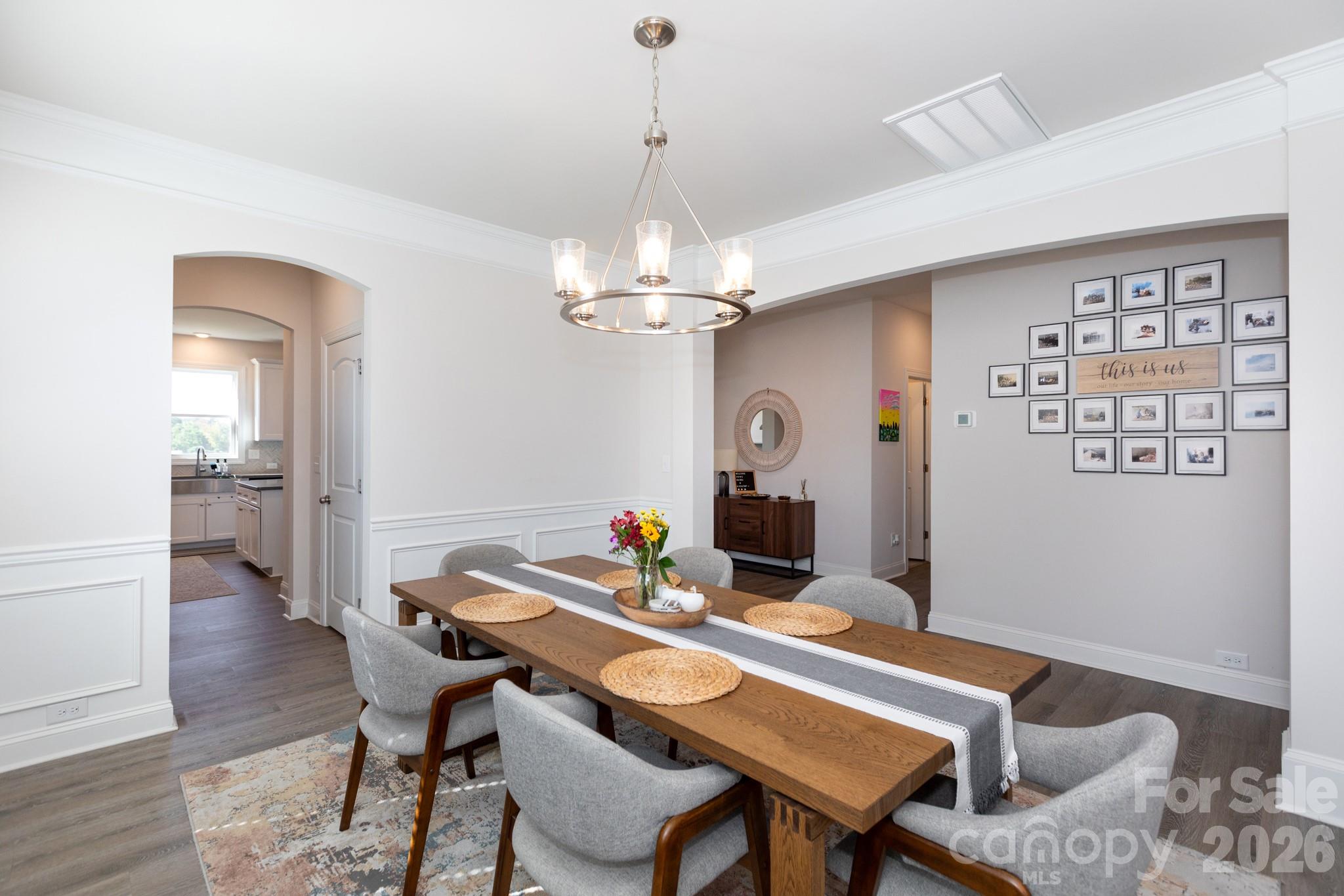 5415 Haystack Avenue Indian Land, SC 29707 - Photo 4 of 44 a view of a dining room with furniture and wooden floor