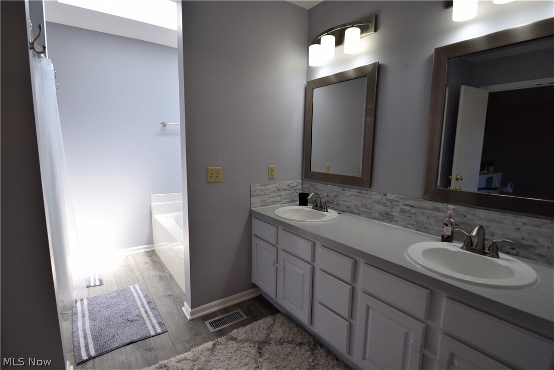 6184 Rockside Circle Northwest Canton, OH 44718 - Photo 15 of 31 Master Bathroom *Double Sink Vanity *Separate Shower *Soaker Tub *Walk In Closet