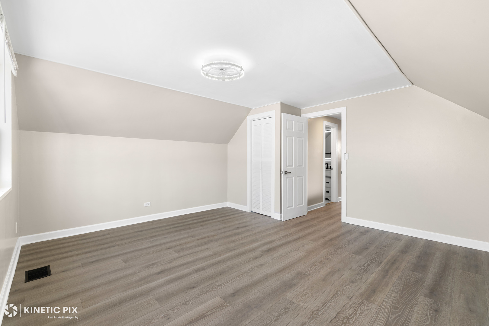 1412 West Broadview Avenue Crete, IL 60417 - Photo 18 of 28 a view of an empty room with wooden floor