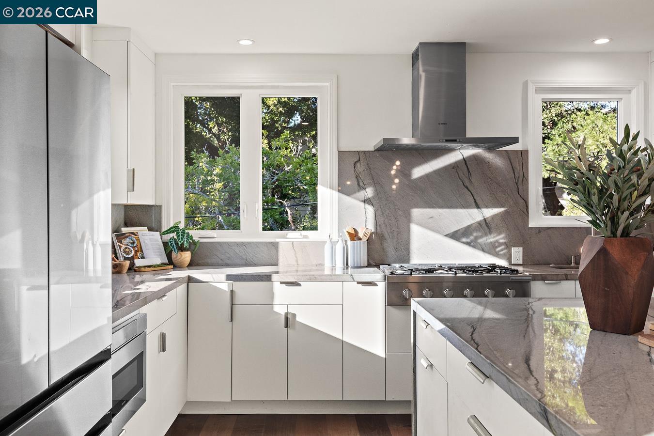 85 Ardmore Road Kensington, CA 94707 - Photo 12 of 45 a kitchen with a sink stove and cabinets