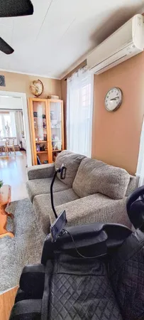 a living room with a couch and a table