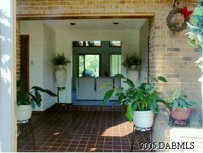 14 Remington Road Ormond Beach, FL 32174 - Photo 2 of 8 a view of a entryway door of the house