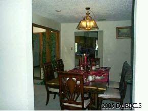 14 Remington Road Ormond Beach, FL 32174 - Photo 7 of 8 a view of a dining room with furniture
