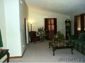 14 Remington Road Ormond Beach, FL 32174 - Photo 8 of 8 a lobby with furniture and potted plants