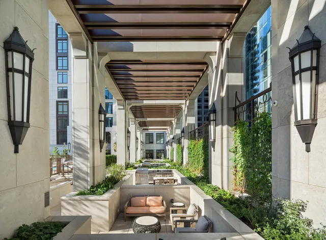 a front view of a house with outdoor seating