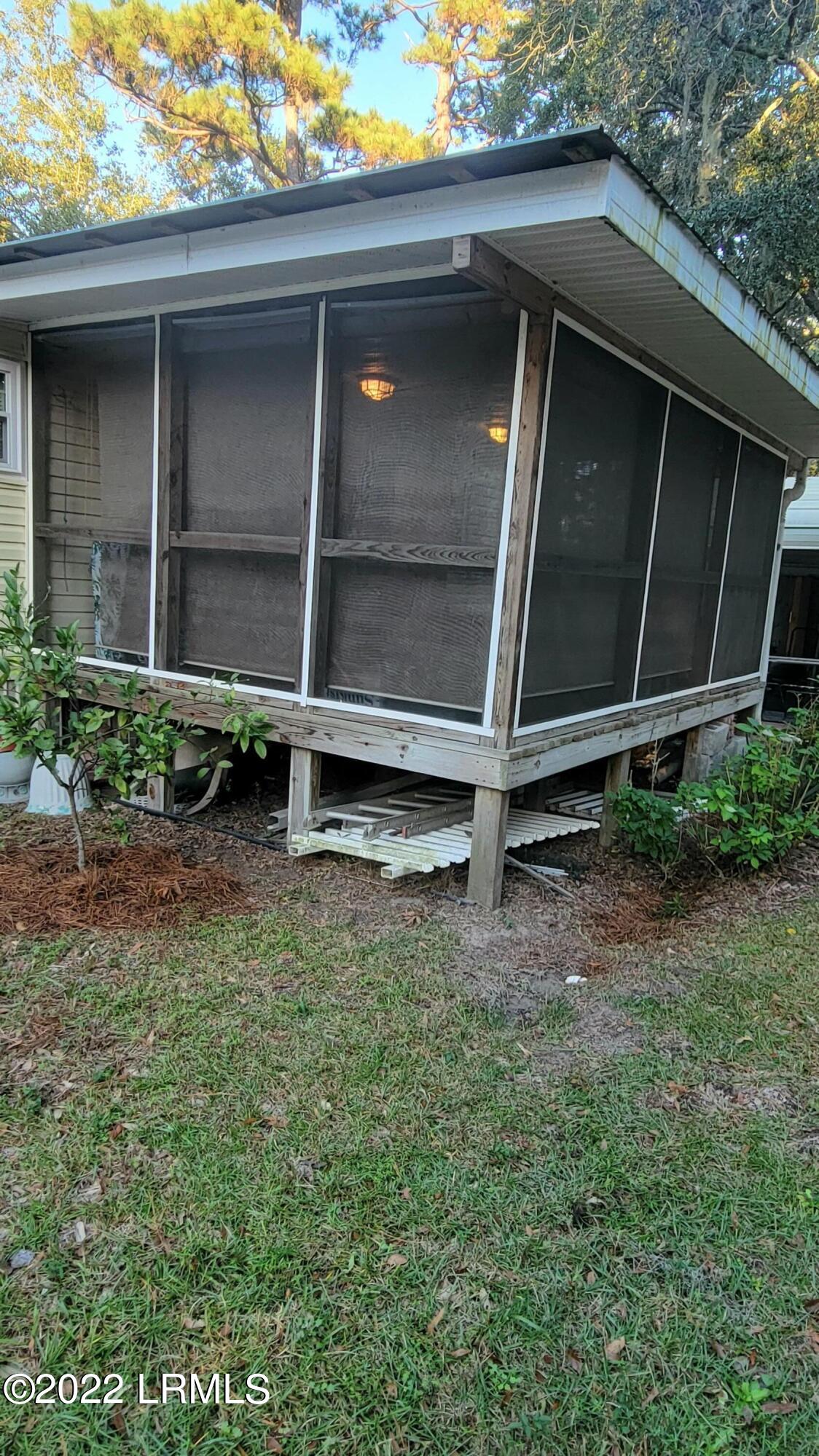 11 Triangle Road St. Helena Island, SC 29920 - Photo 19 of 21 Porch from outside