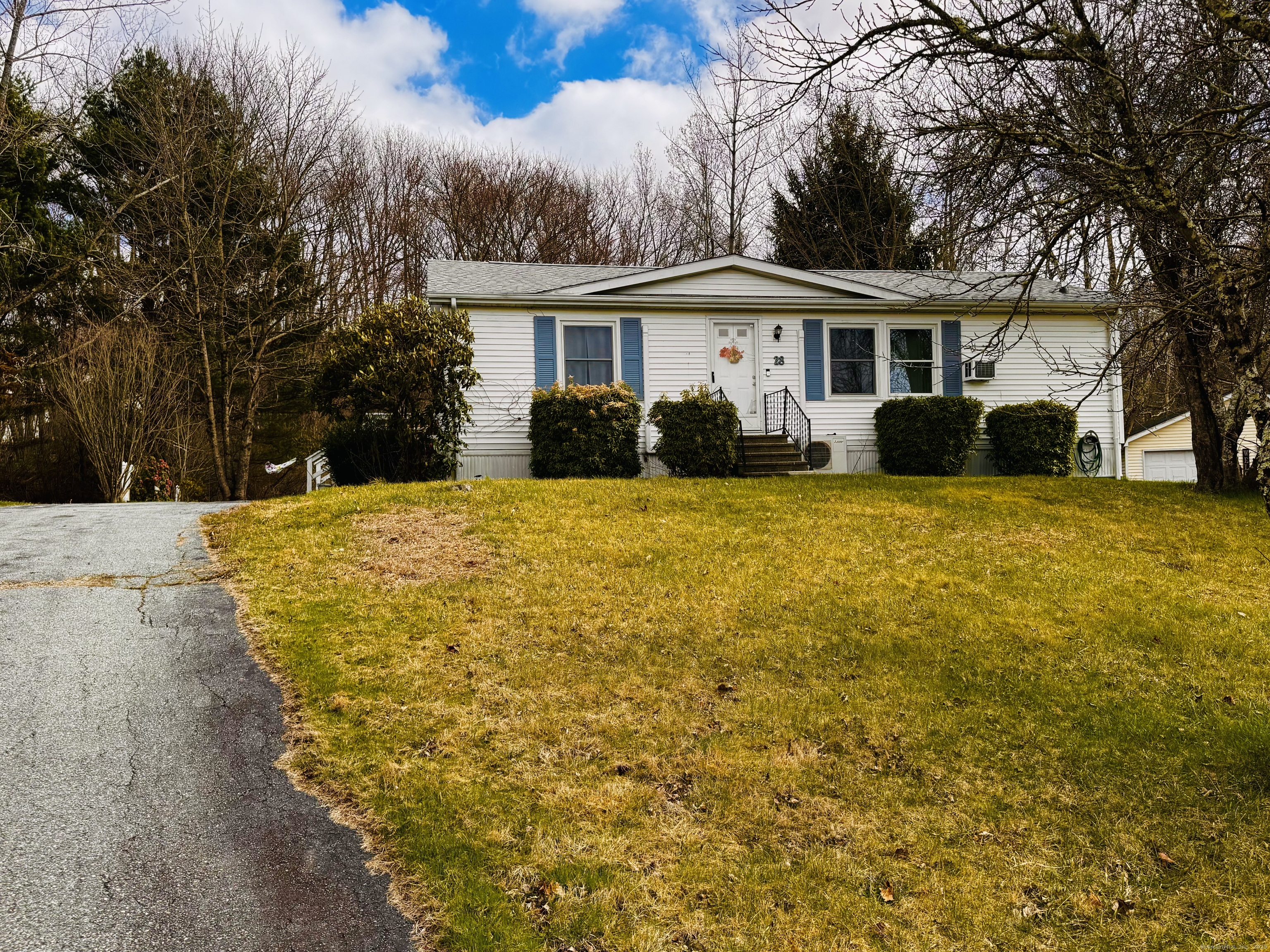 a view of a house with a yard