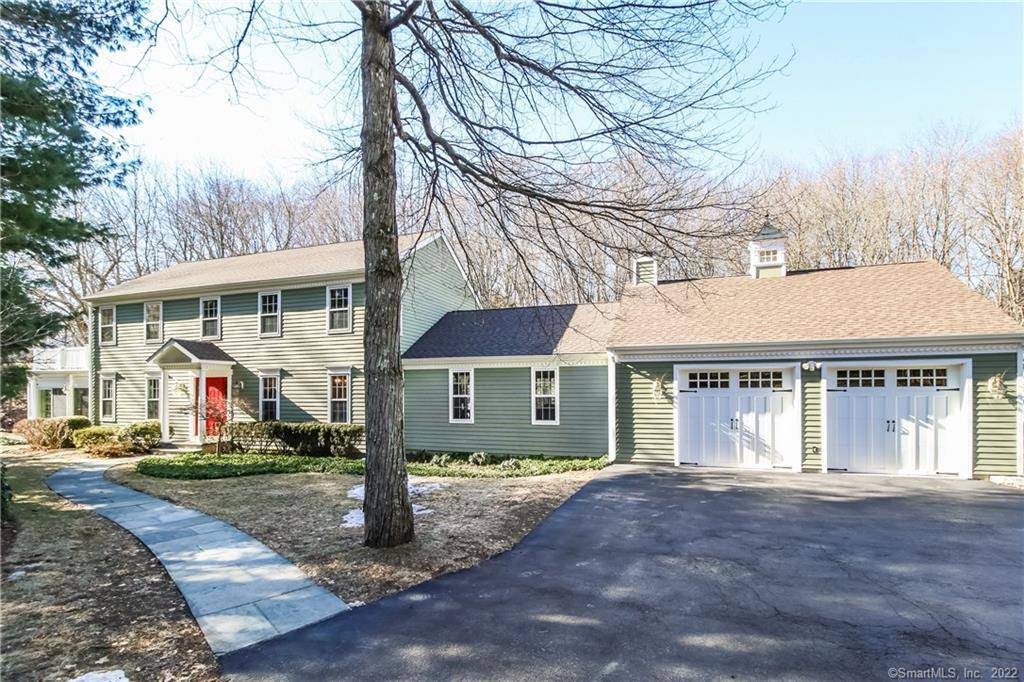 front view of a building with a yard