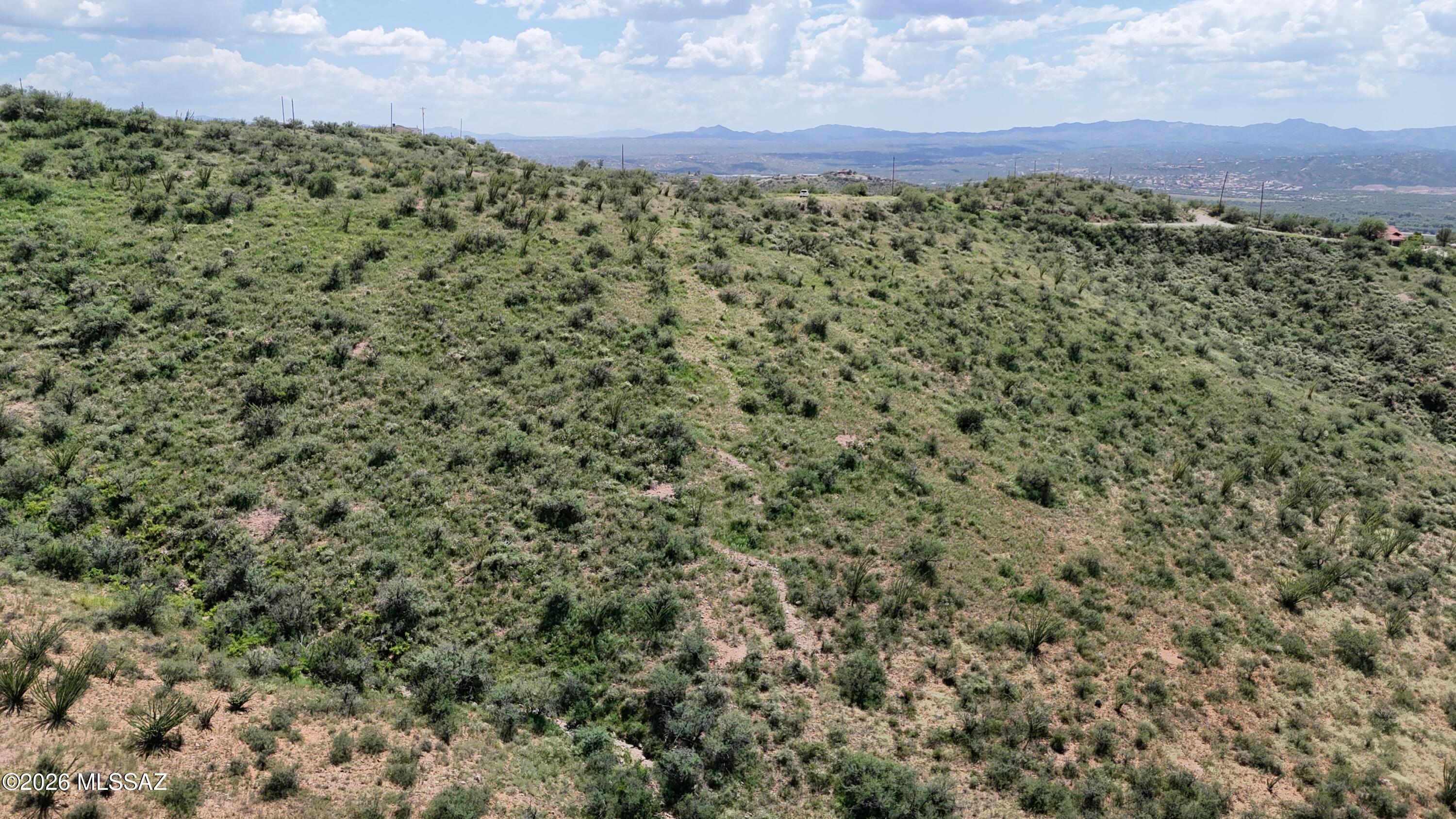 328 Camino Canoa, Unit 19 Rio Rico, AZ 85648 - Photo 5 of 10 DJI_20260818132304_0288_D_328CC