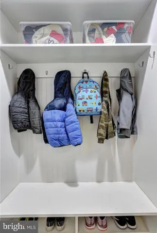 a view of porch with a bench