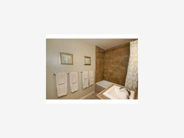 22971 Longdown Road Cupertino, CA 95014 - Photo 7 of 9 a picture of a room with a bench