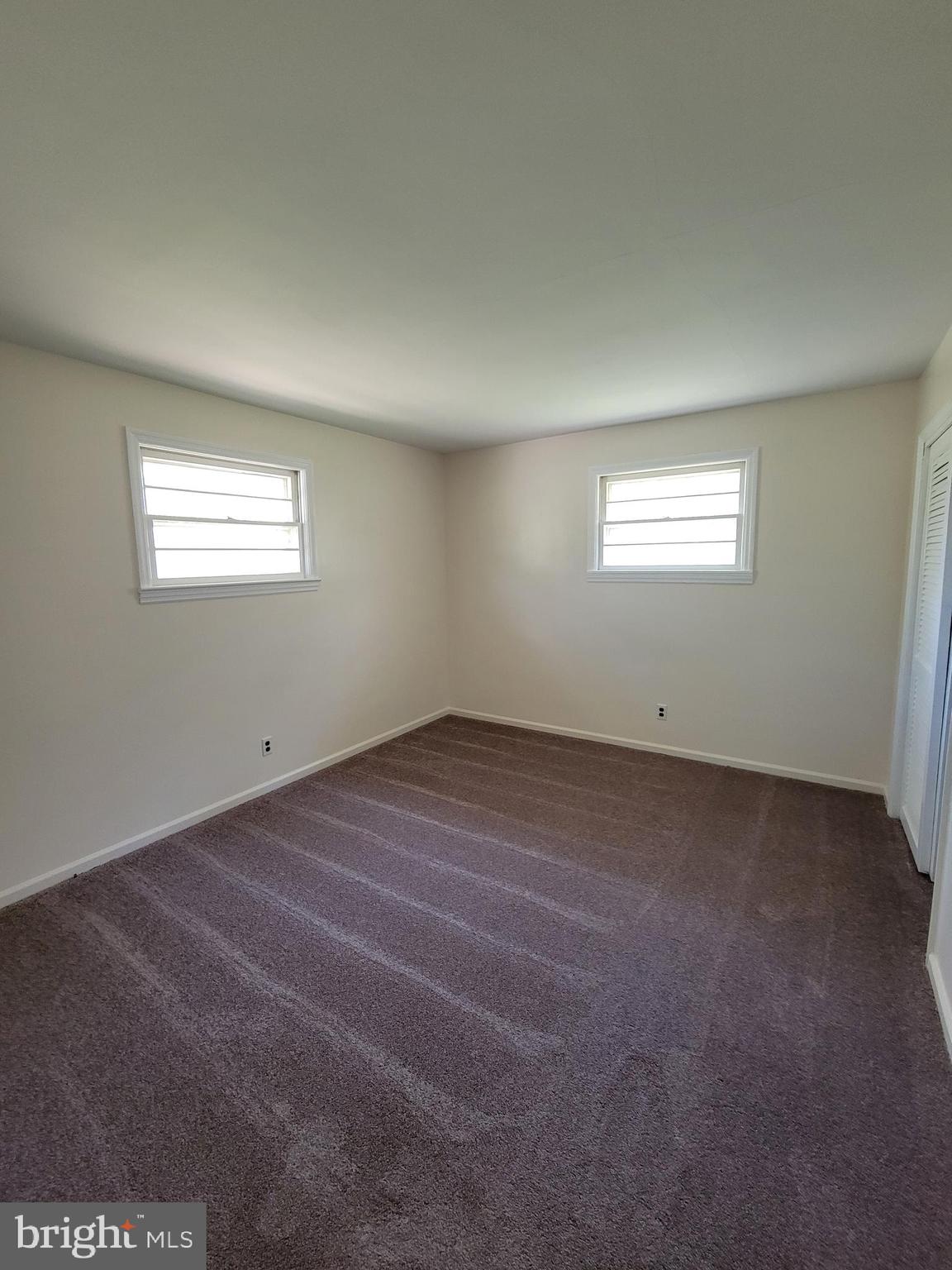 2671 Egypt Road Audubon, PA 19403 - Photo 14 of 25 an empty room with a empty space and windows