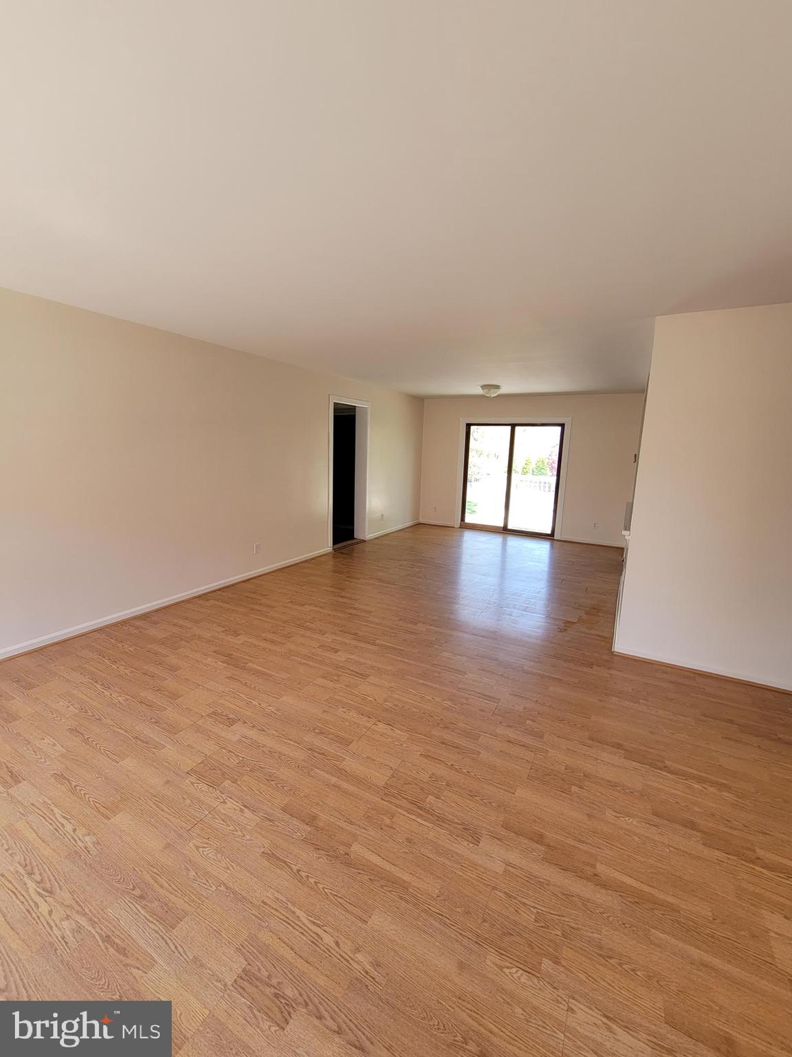 2671 Egypt Road Audubon, PA 19403 - Photo 2 of 25 a view of an empty room with window and wooden floor